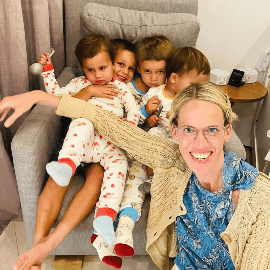 Instagram post: a family in pajamas on an armchair